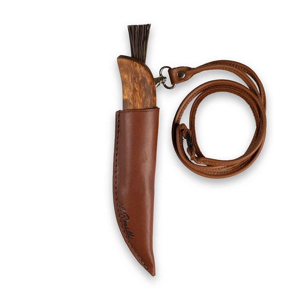 Finnish handmade mushroom knife made from carbon steel and curly birch. Comes with a handmade leather sheath and a mushroom brush made from arenga fiber